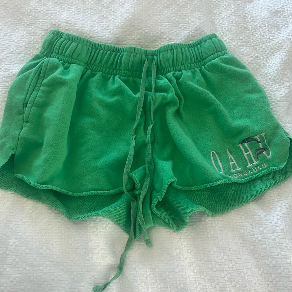 green women’s shorts , medium